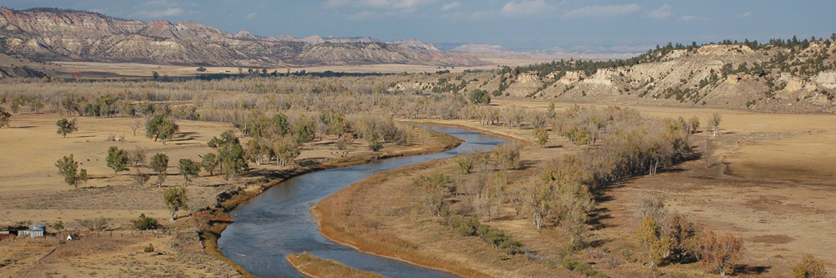 river winding through brown Montana foothills