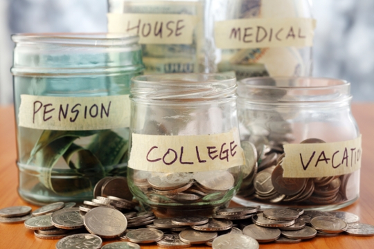 Decorative Image of Loose Change Being Saved in Jars for Pension, College, Vacation, Medical Expenses 