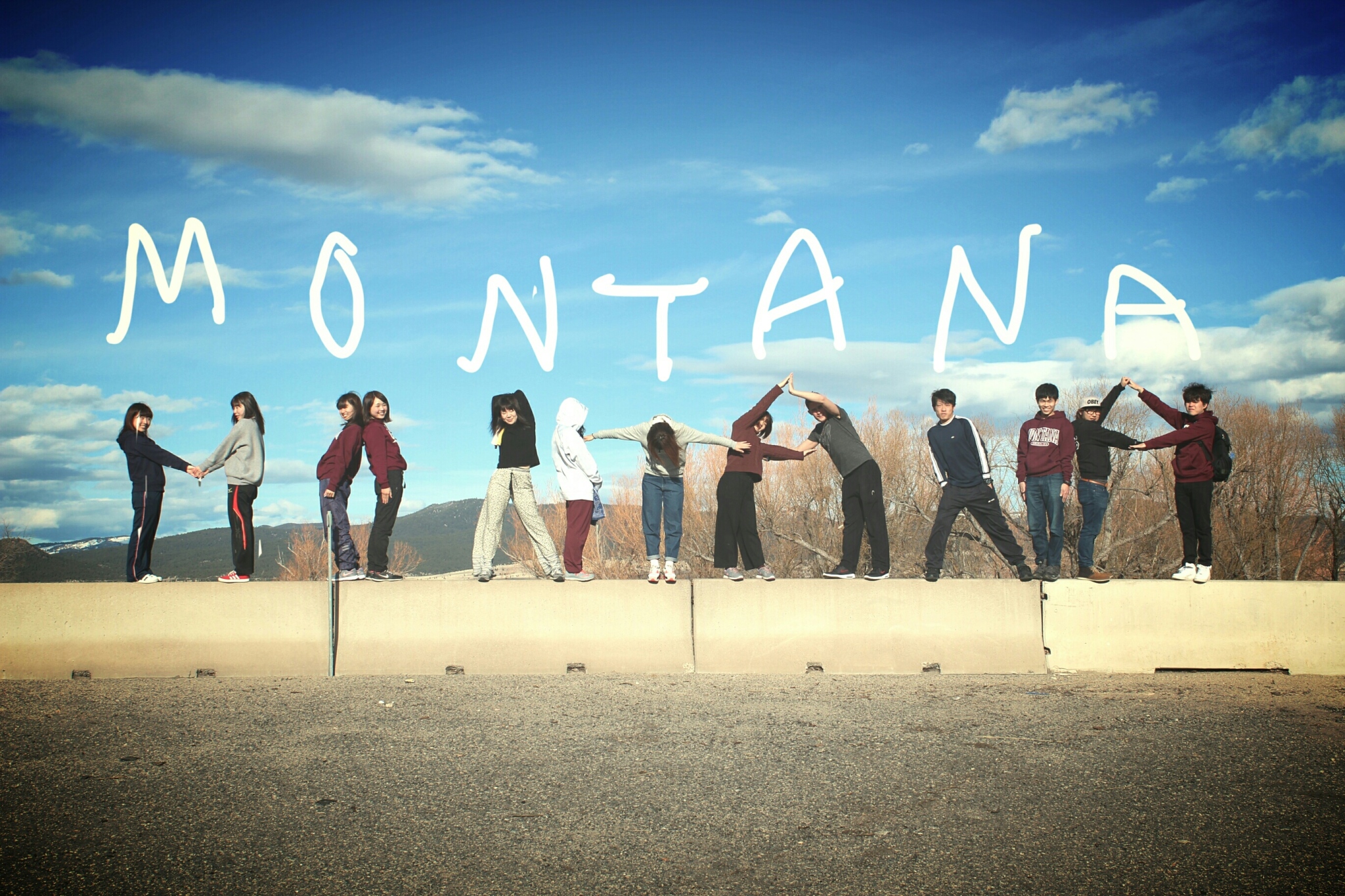 International students pose to spell out the name Montana