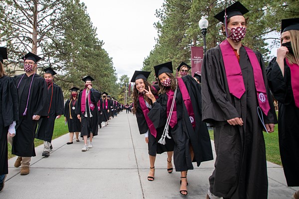 Photo of UM graduates in commencement processional