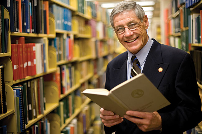 UM President George Dennison in the Maureen and Mike Mansfield Library. (Photo by Erik Stenbakken)
