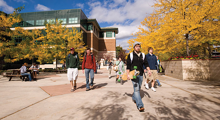 Students walking near UM's Gallagher Business Building