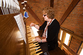 Anytime music rises from the Main Hall clock tower, there is a real person inside making it. Nancy Cooper, UM’s official carillonneur, has played the tower bells since 1992.
