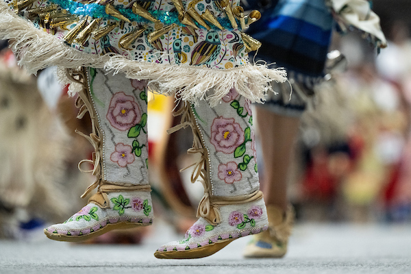 A picture of Indigenous mocassins dancing 