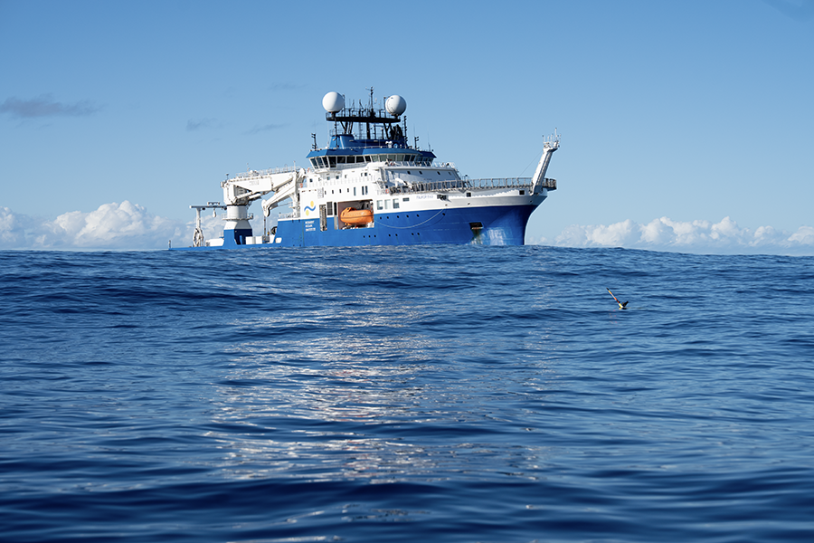 A picture of a giant research vessel on the middle of the ocean