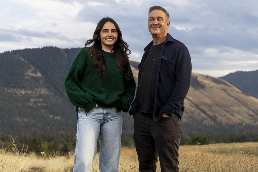 A photo of Stephen Yoshimura and Jess Reilly standing on the Sunlight Trail in Missoula. 