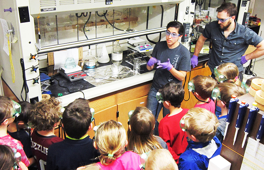 Asia and Nick teach children about the magic of chemical reactions