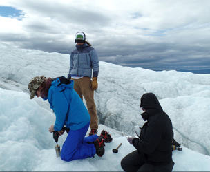 Sampling microbes on the Greenland icesheet (Photo credit: Bill Holben)