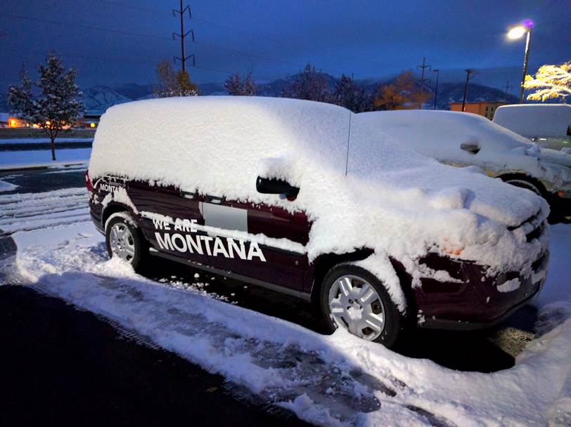 Snow covering an SUV Snow covering an SUV