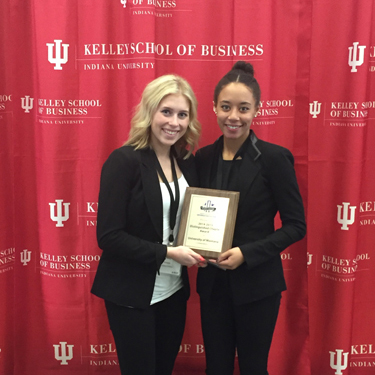 Emily Eicholtz and Erika Disney accepting award