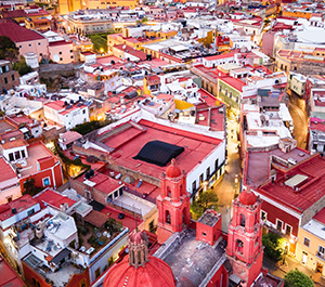 Overlooking the red roof-tops of a Mexican town.
