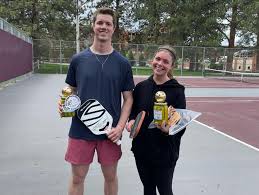 Griz Pickleball players holding trophy