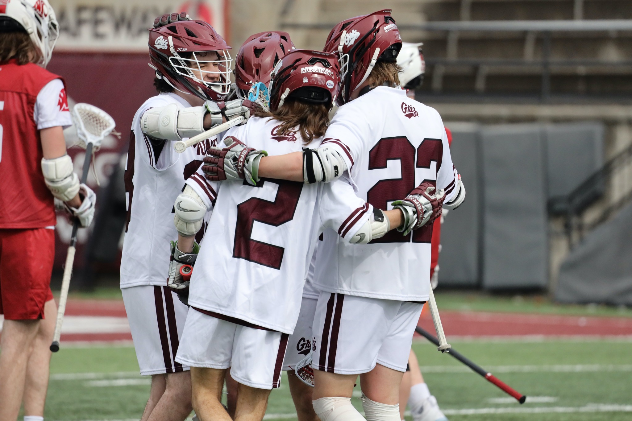 Griz Lacrosse Team Celebrating against Washington State