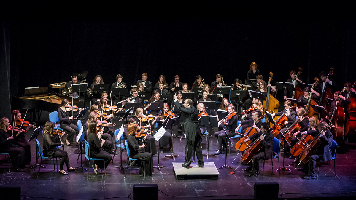 UM Orchestra performing in the Dennison Theatre