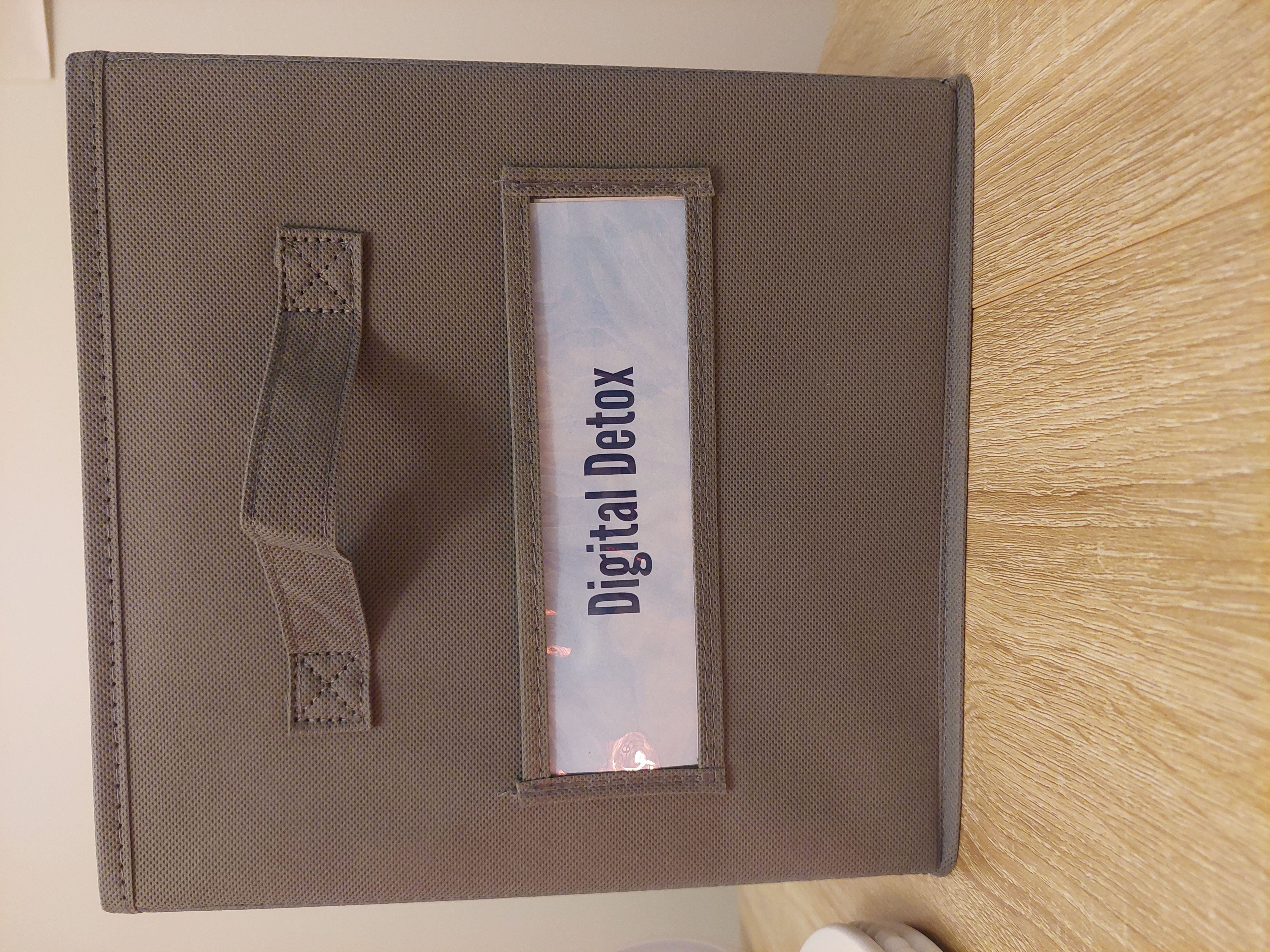 image of a cloth bin with the a label saying digital detox