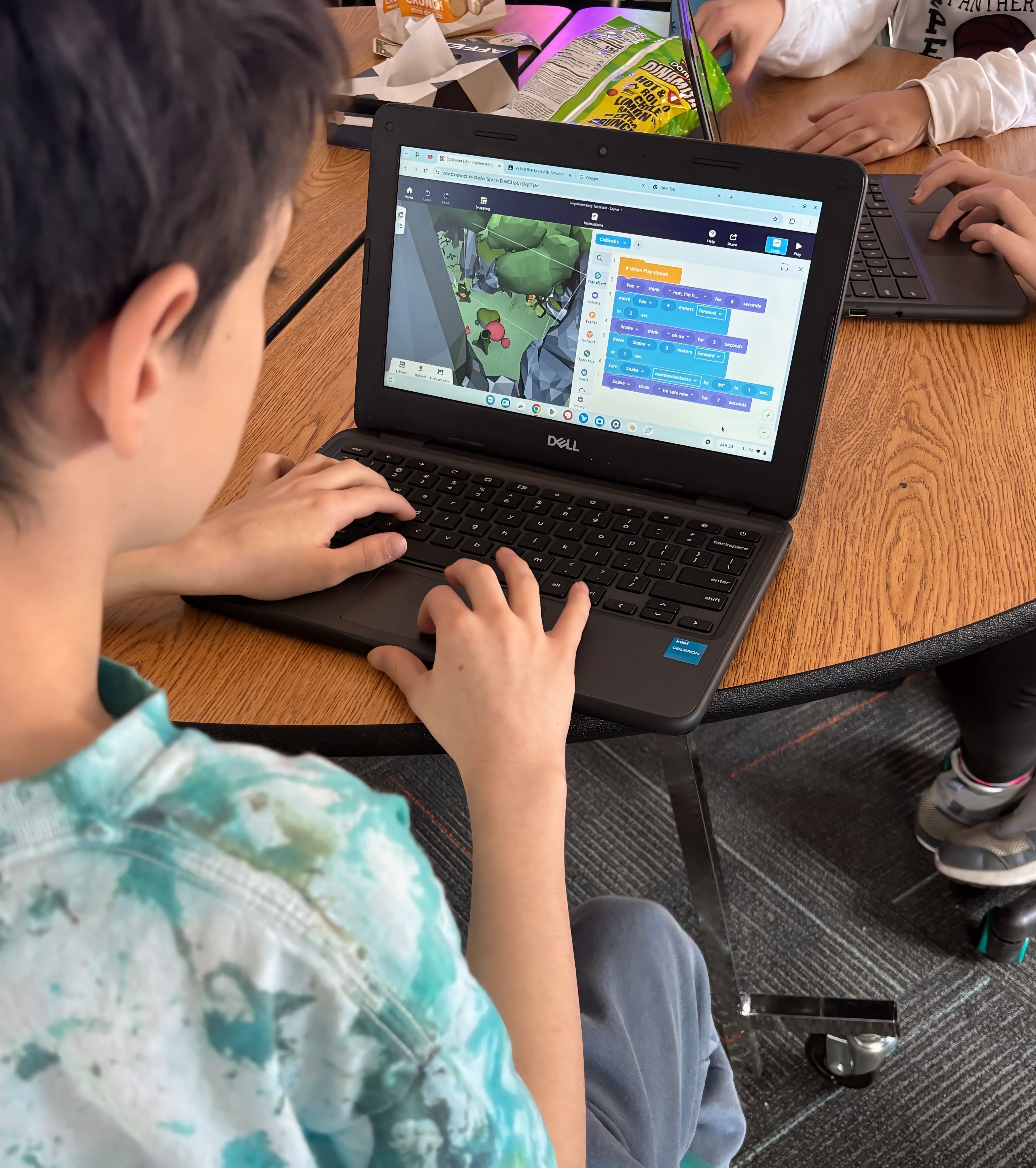 Student using AI on computer.