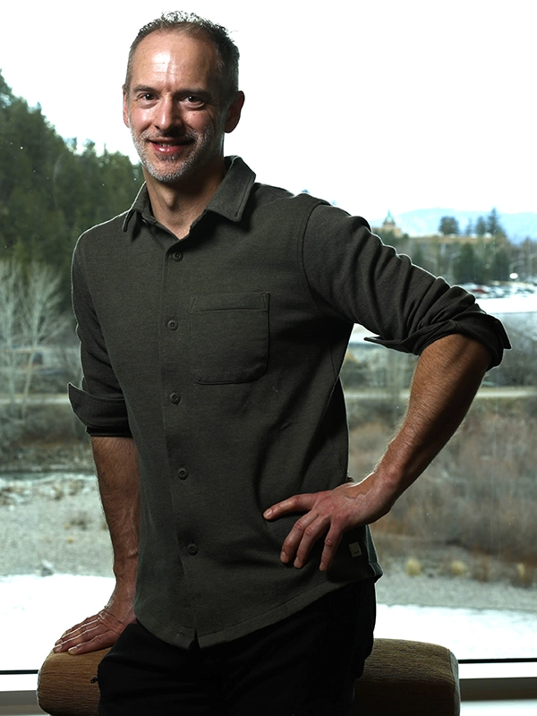 Lucas Whitcher in front of window