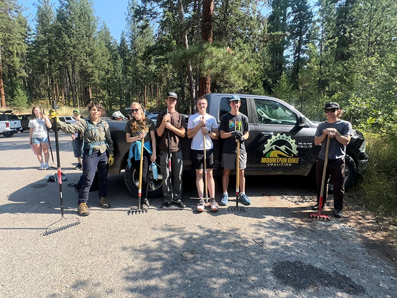 Students participating in trail clearing work in Pattee Canyon and a bike tour of the Rattlesnake Valley, experiences organized by the Geography Program and the Missoula Mountain Bicycle Coaltion. 