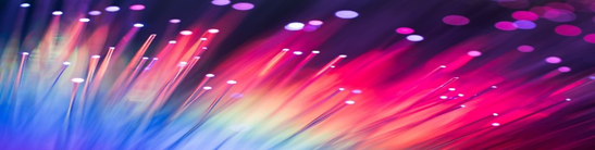 Abstract illustration of colorful light trails representing digital connectivity and vibrant energy.