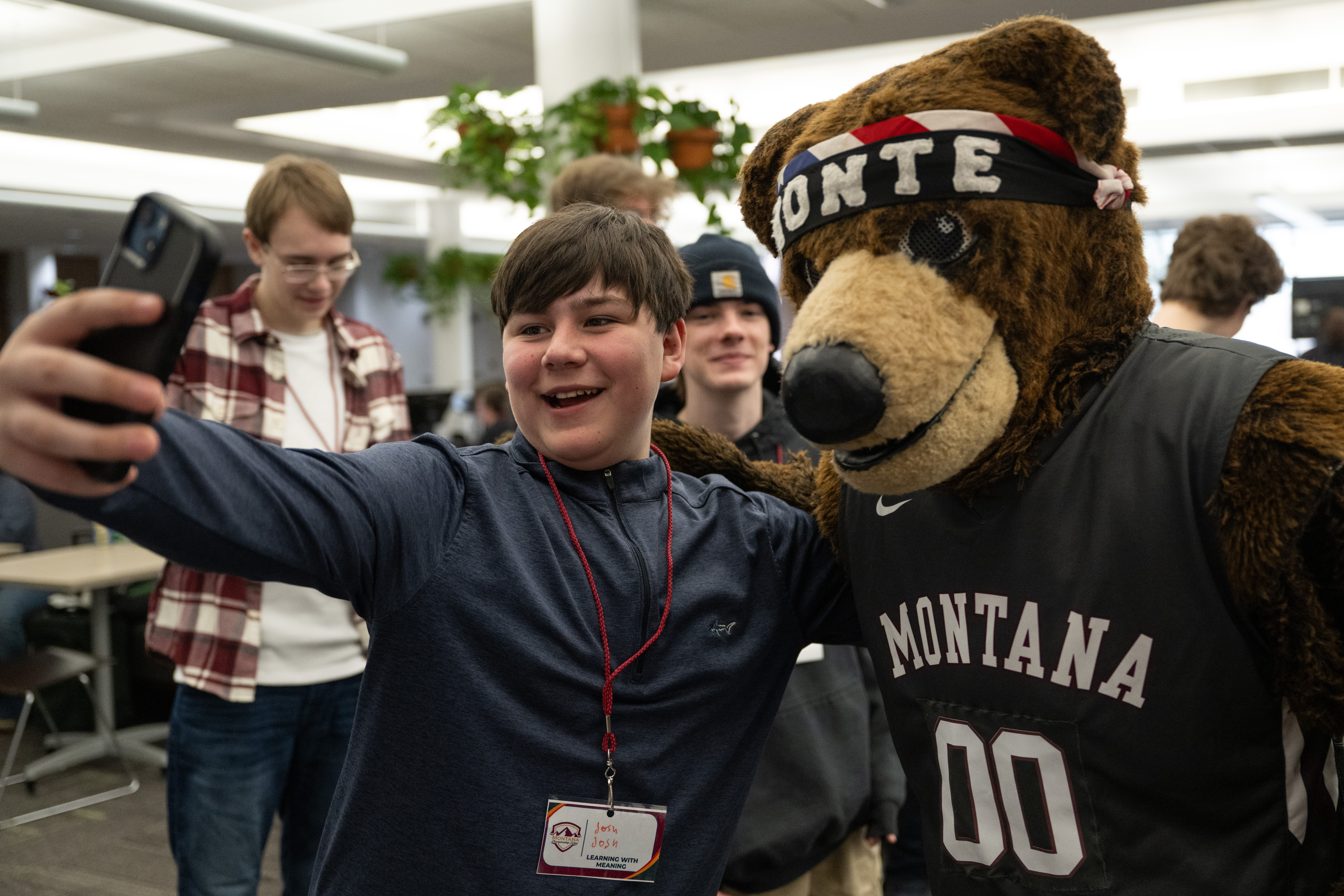 Montana high school championship student athletes with Monte