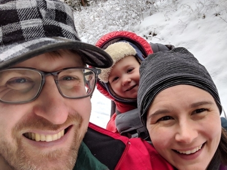 Brett Bell with her husband and child.