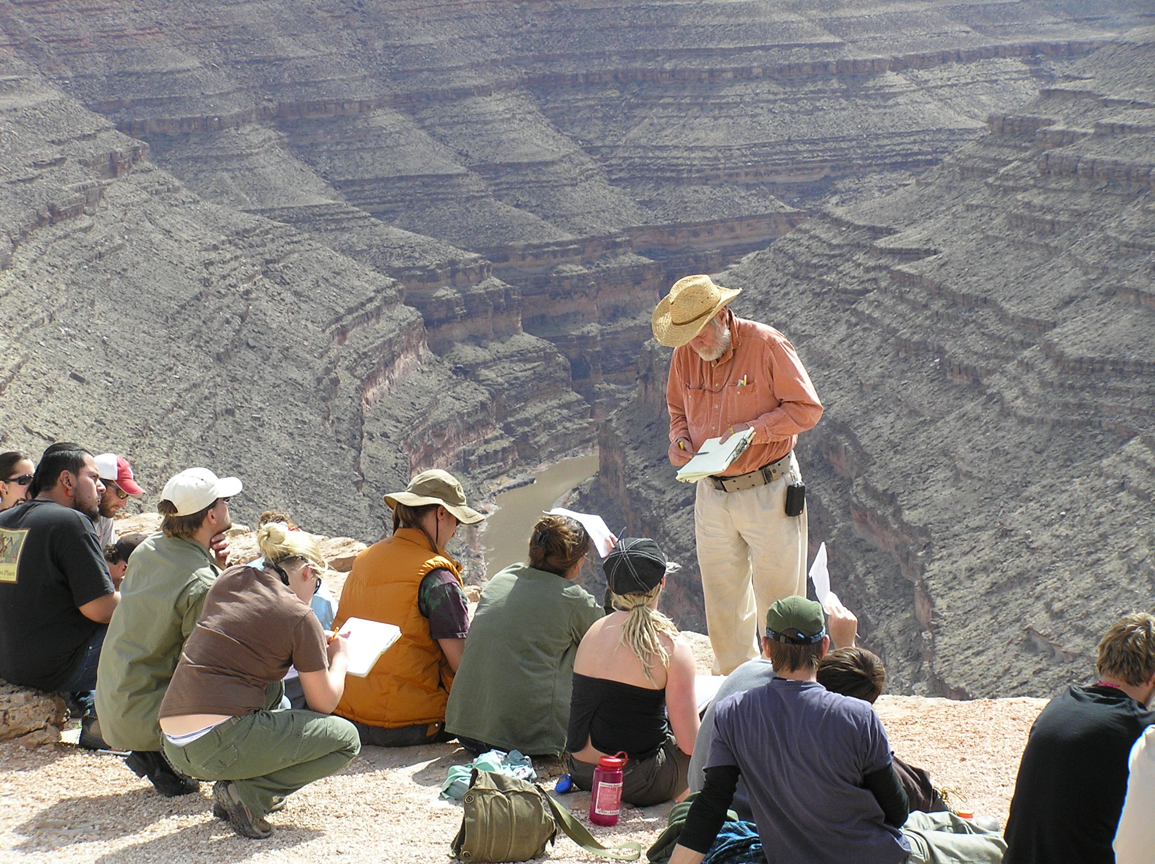 Don Winston teaches class on the edge of a giant canyon.