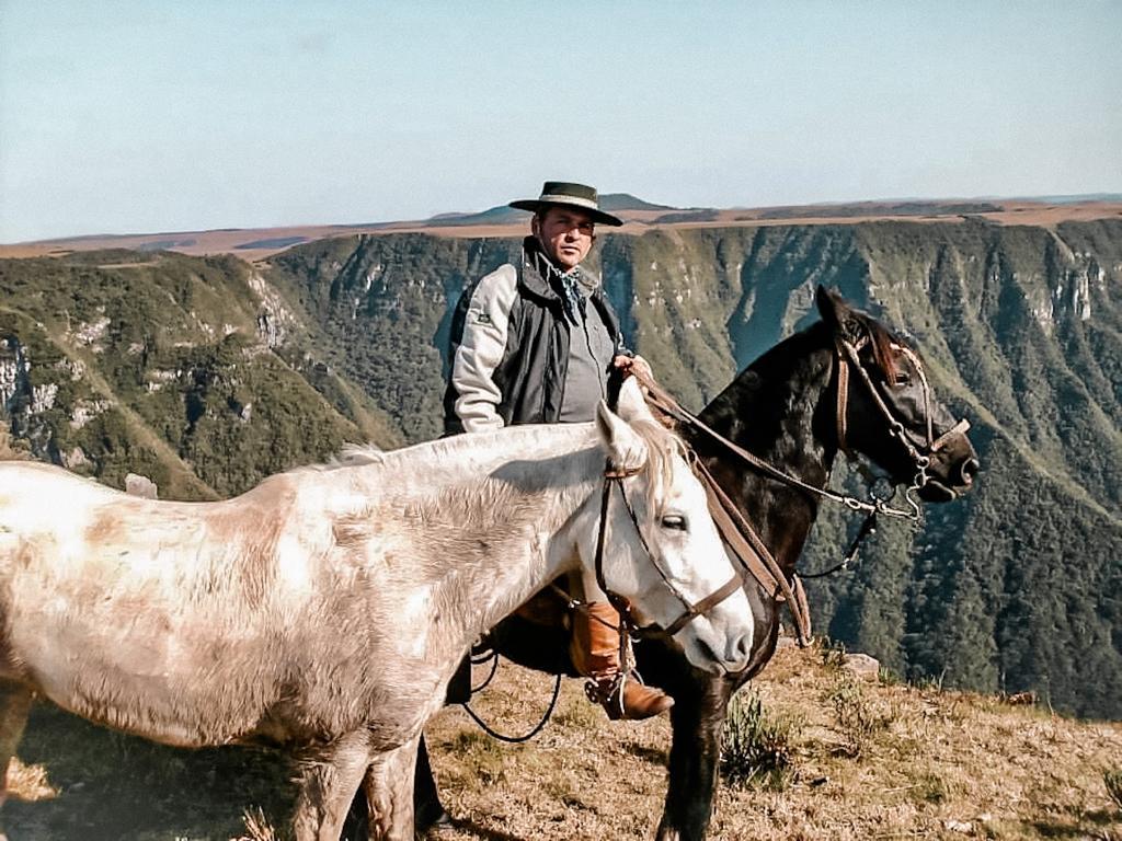  taken in the Aparados da Serra National Park, where the gaucho riders were gathered to go on horseback riding during Farroupilha Week, which takes place every year in September, when Gaucho Day is celebrated in the State of Rio Grande do Sul. It’s a very strong and local culture, influenced by Uruguayan culture.