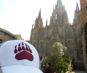 Griz-branded hat with a cathedral in the background