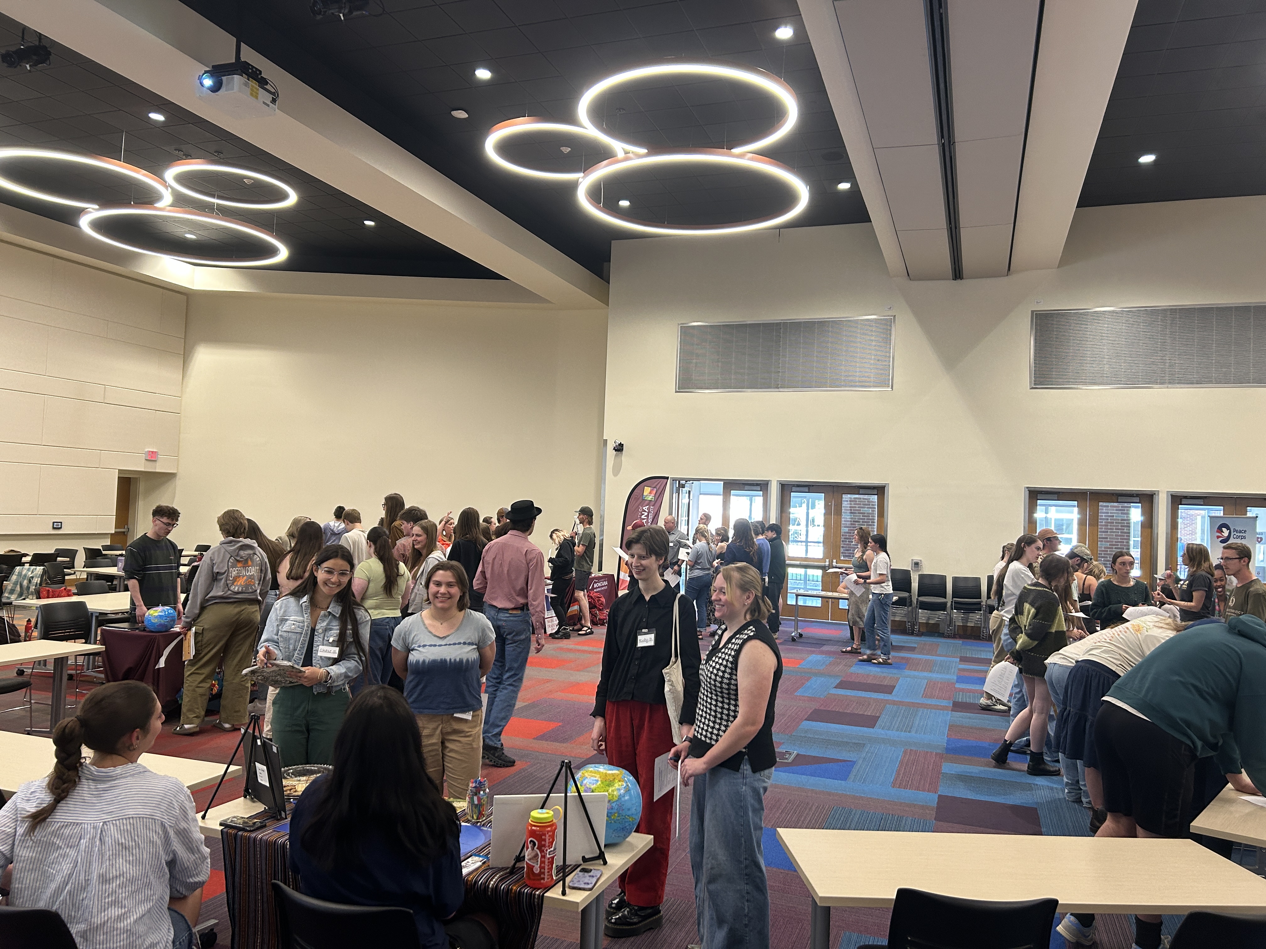 students visit the tables of various campus stakeholders to inquire about beyond the classroom opportunities