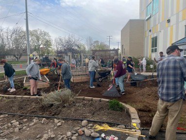 students build raised garden beds for local schoo