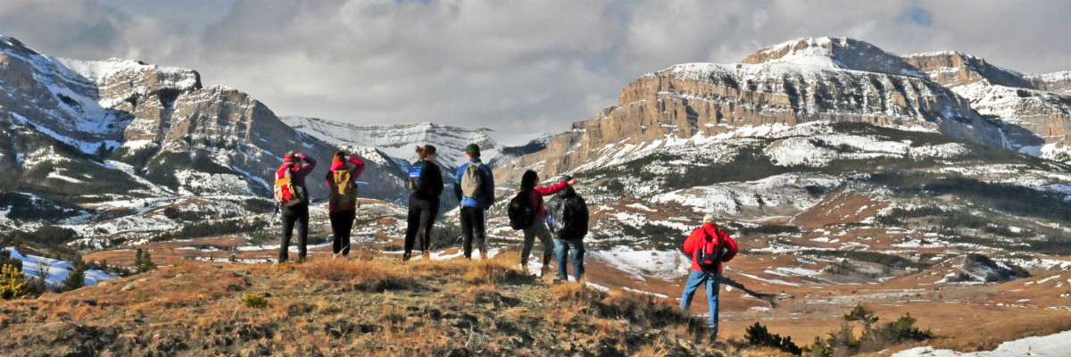 Photo of students looking at the Rocky Mountain Front. 