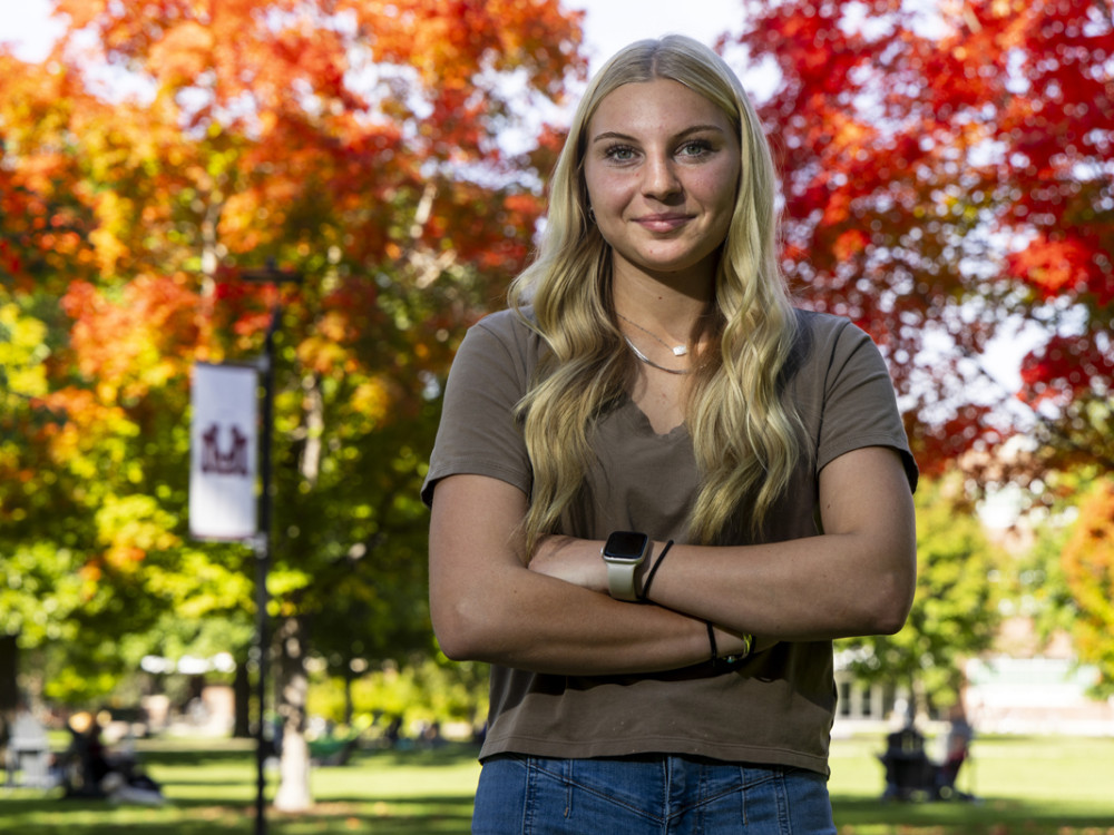 Kaycee Eubanks standing on the UM campus