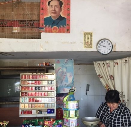 women in kiosk in china