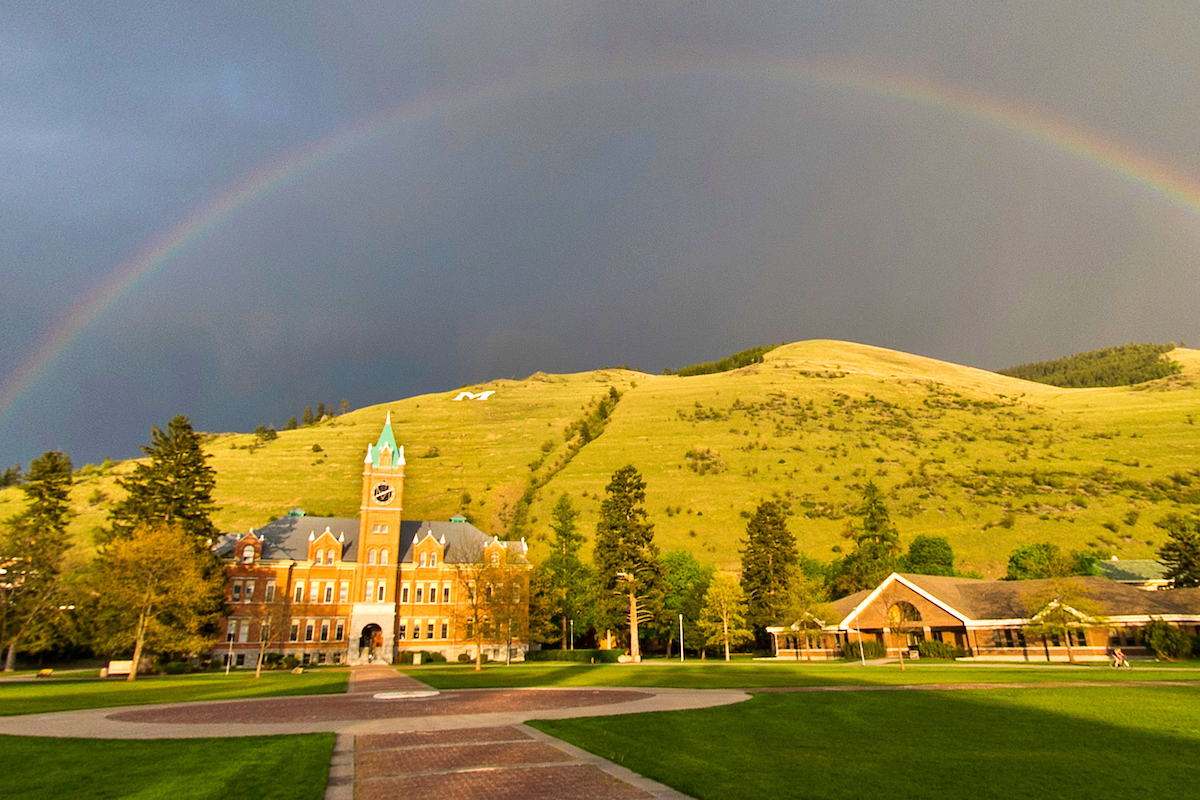 UM Main Hall and Davidson Honors College with a rainbow overhead