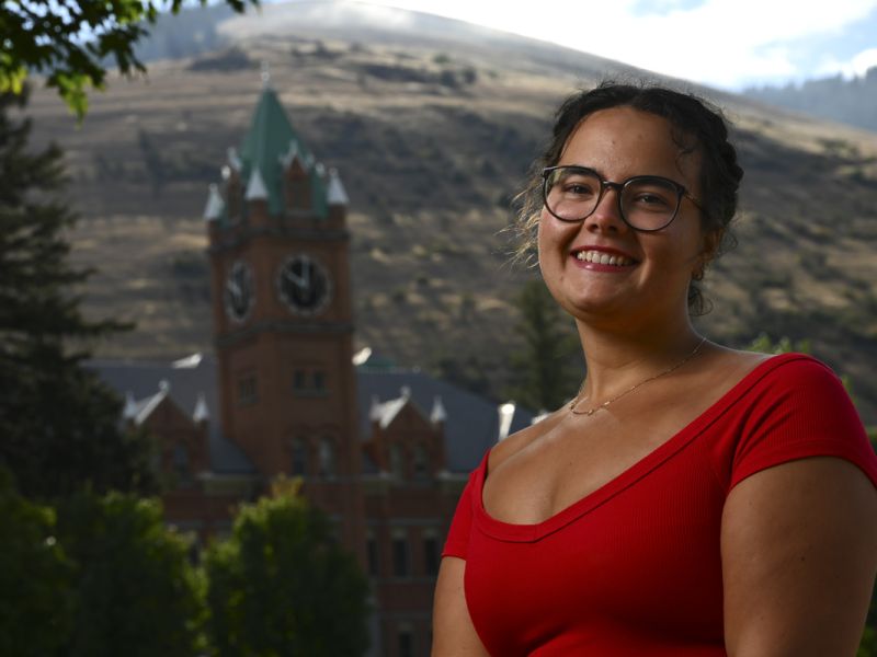 UM student Ava Web smiles in front of Main Hall