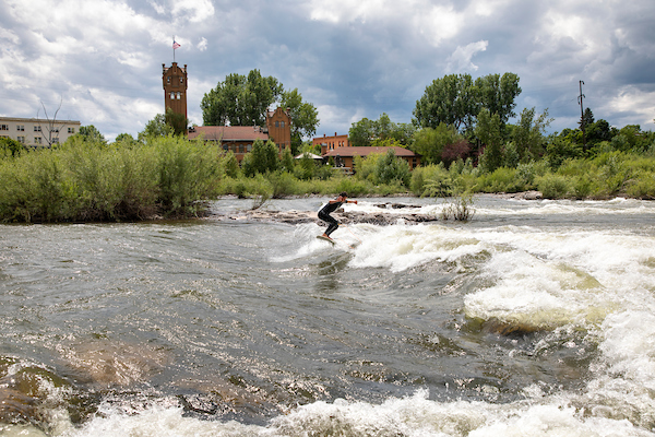 Surfer on brennans wave in downtown Missoula