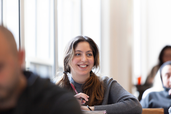 student smiling in class