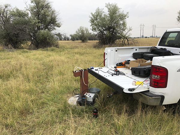 Sampling CFCs and SF6 in the Little Wind River alluvial aquifer.