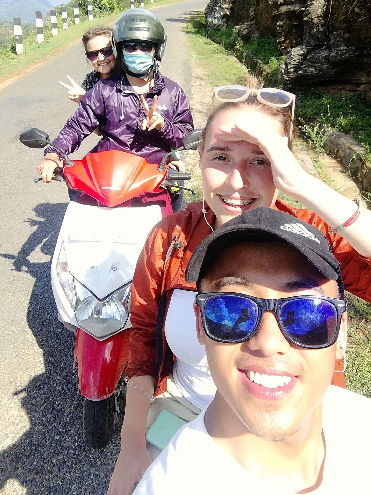 alexandria riding a scooter in Nepal