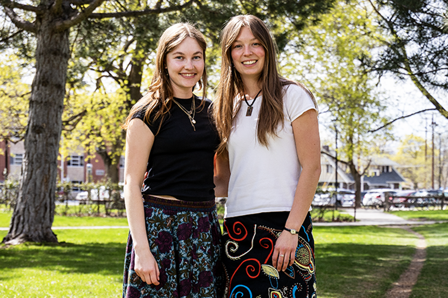 Two female friends and scholarship winners stand side-by-side