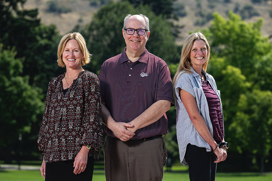 Three new academic deans pose on the UM campus 