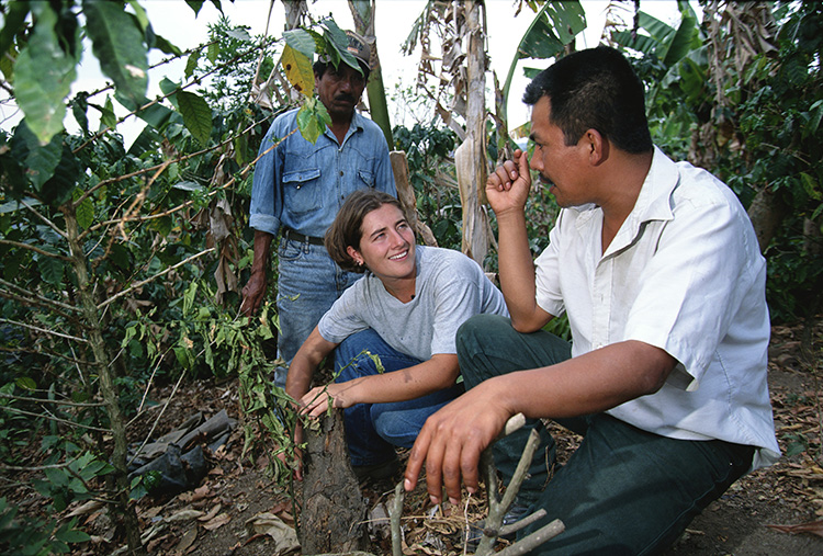 woman working with farmers