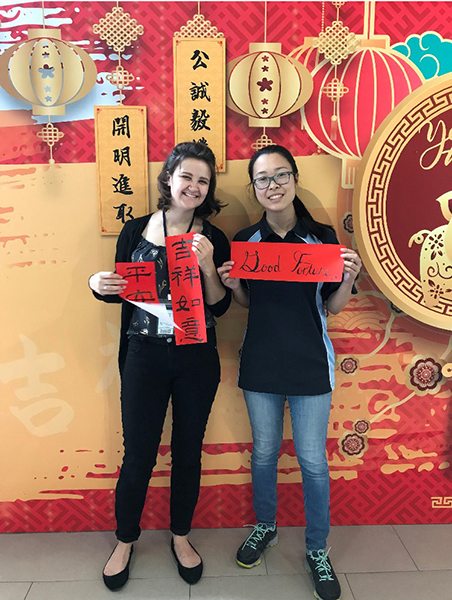 group of individuals at a table in hong kong 