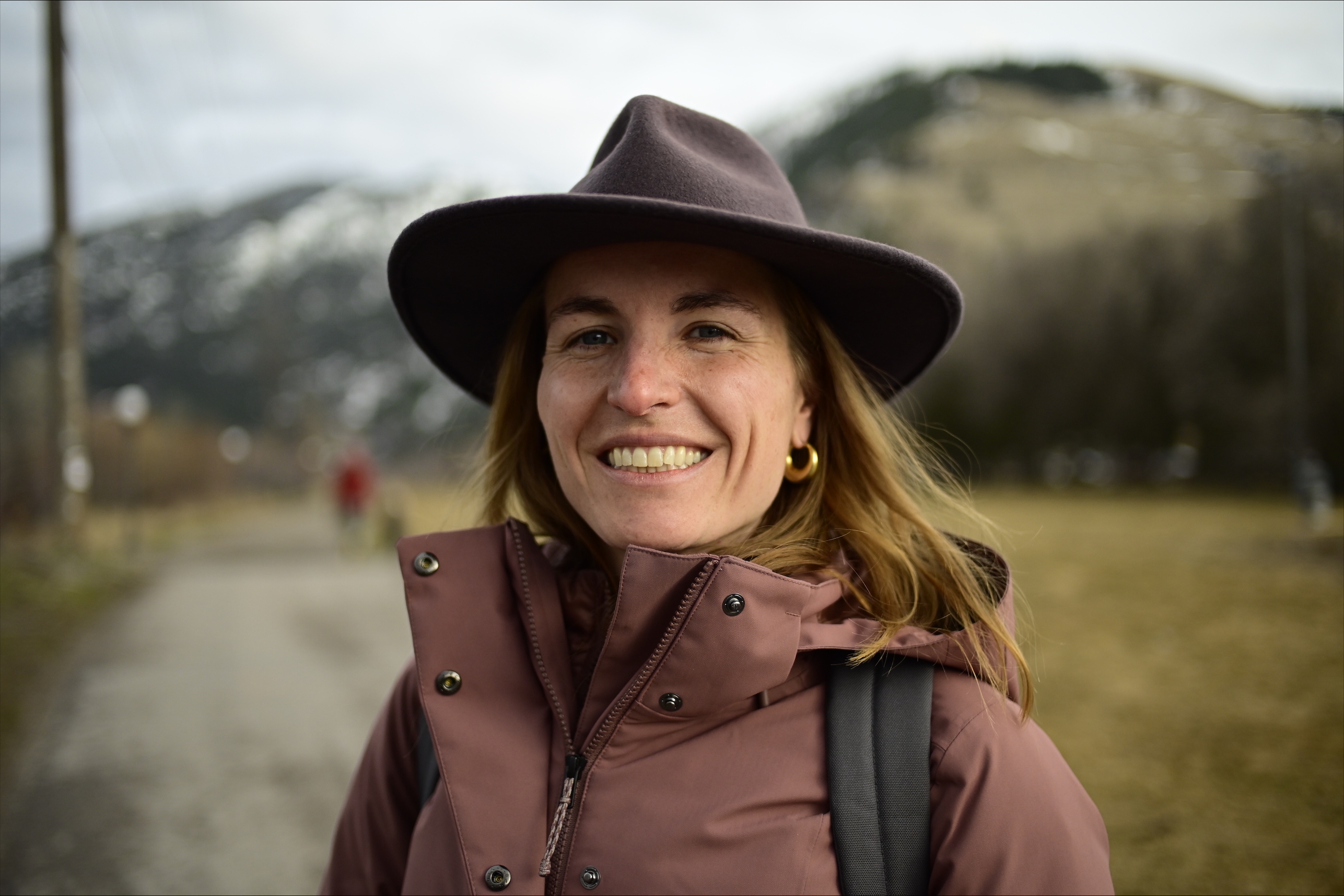 Dr. Hilary Faxon in front of mountains landscape