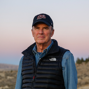 Man in hat looking at camera