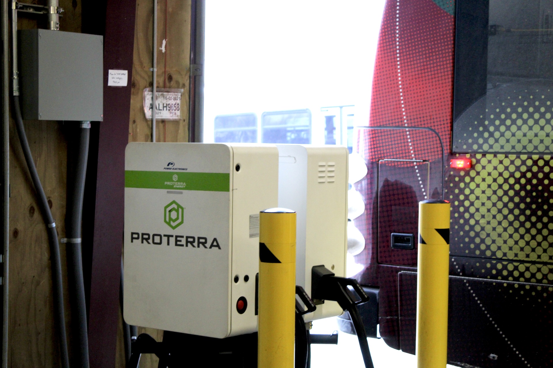 white box that reads Proterra, with charging ports