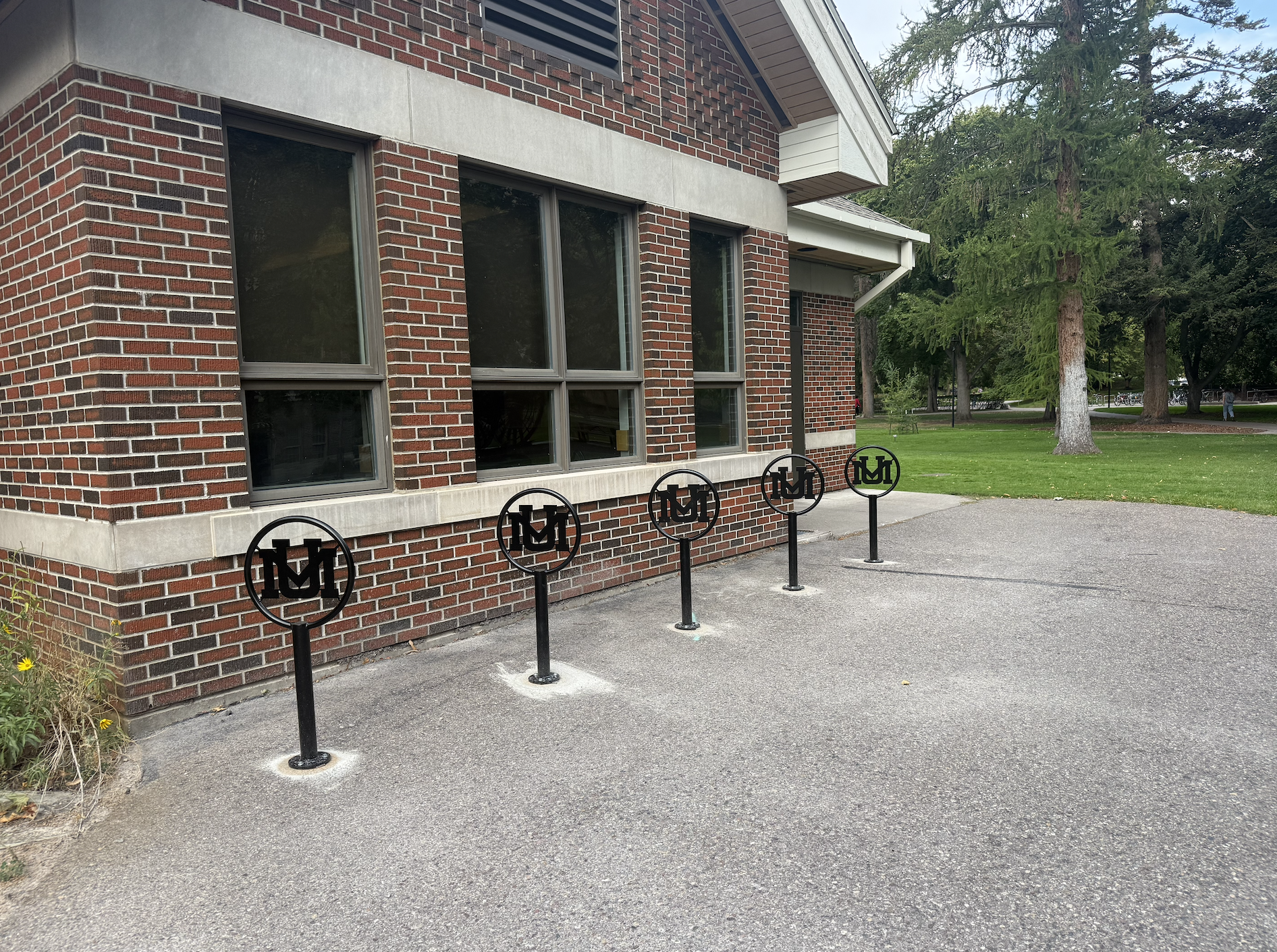 circular bike racks outside the back of the davidson honors college
