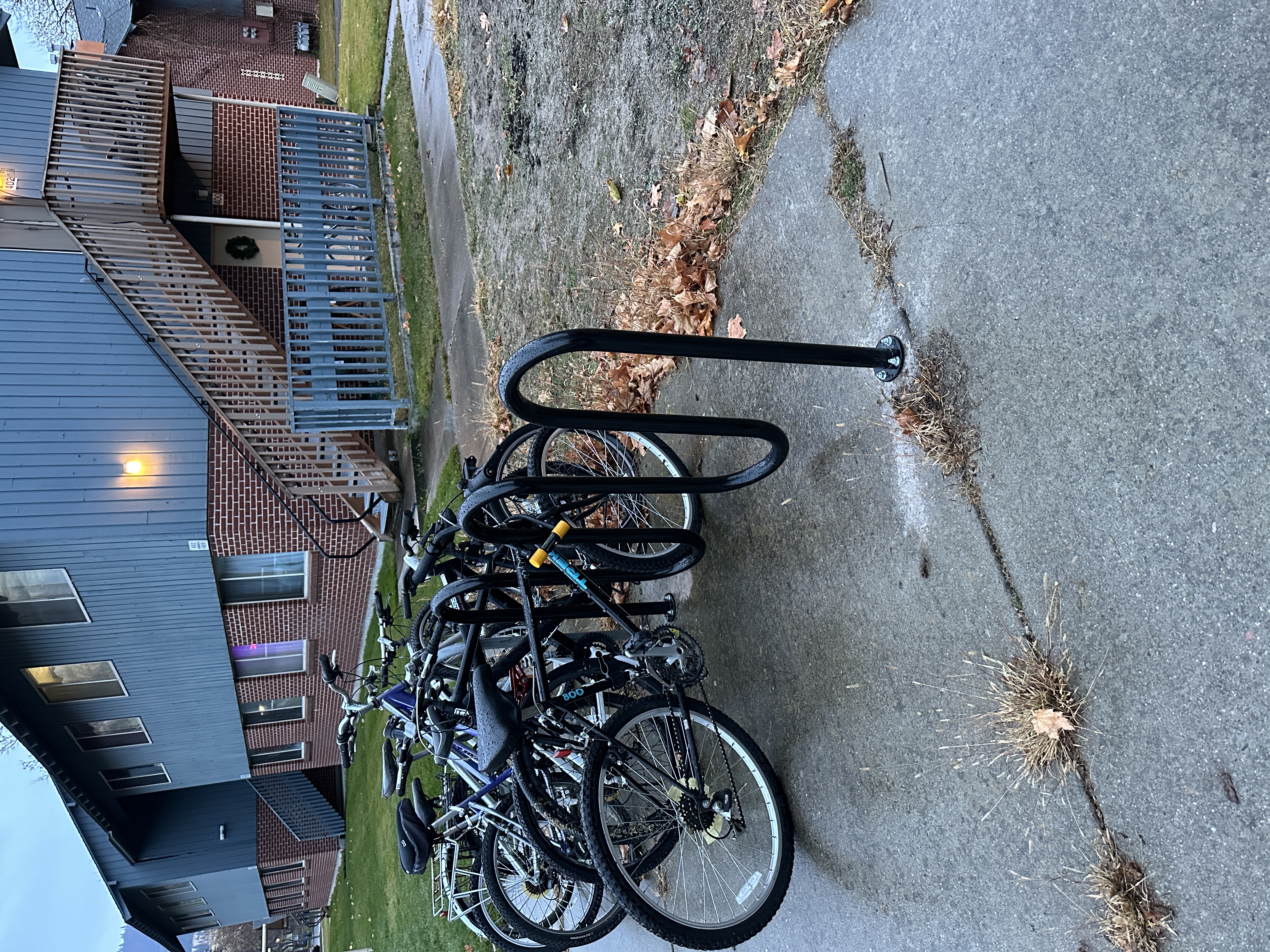 u shaped bike racks filled with bikes near elliot villages