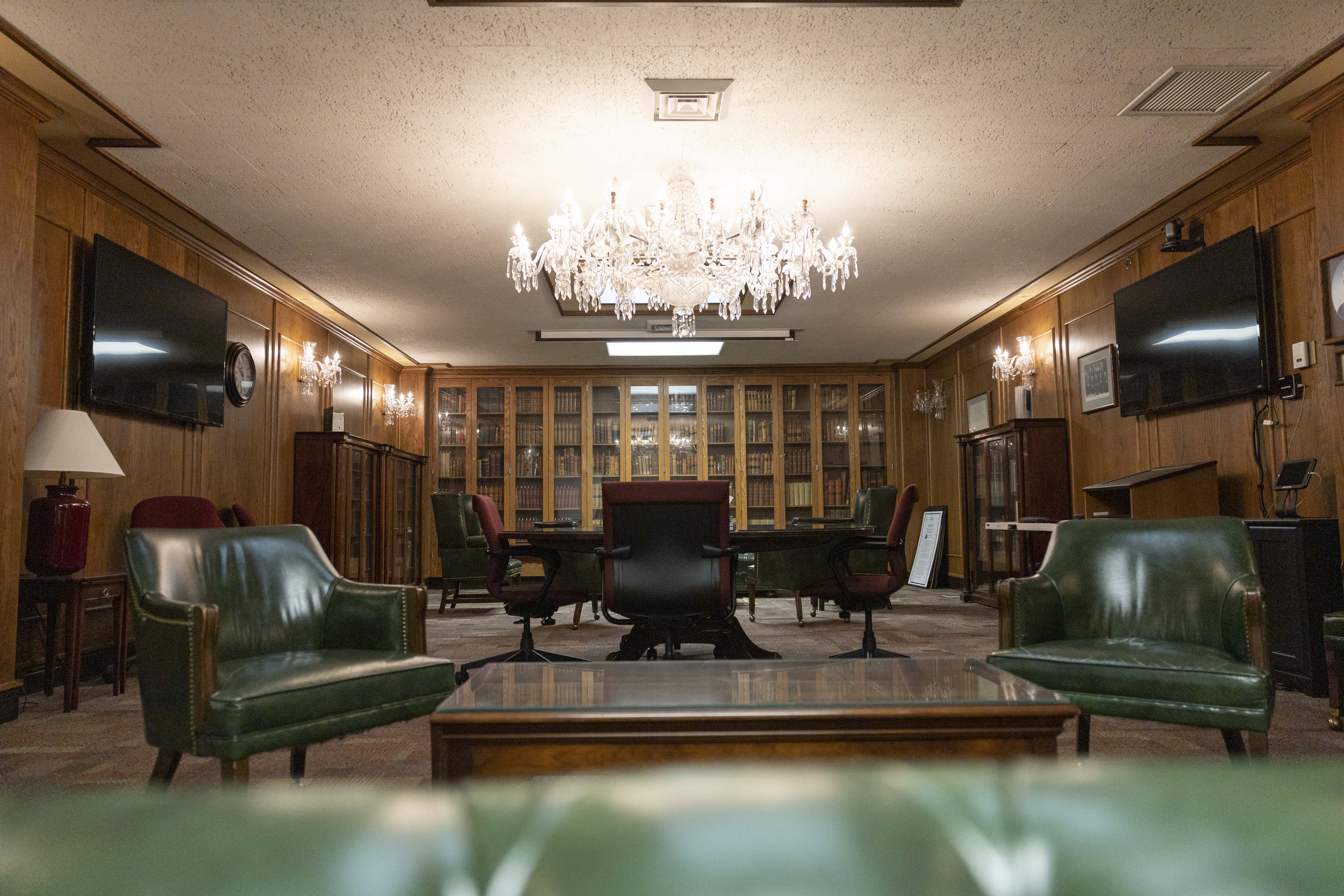 lights shining bright in the pope room in the law building