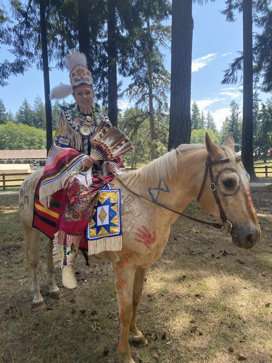 girl sitting on horse
